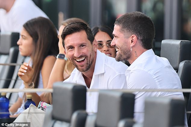 Despite being suspended for the match, Messi was all smiles as he watched from the dugout
