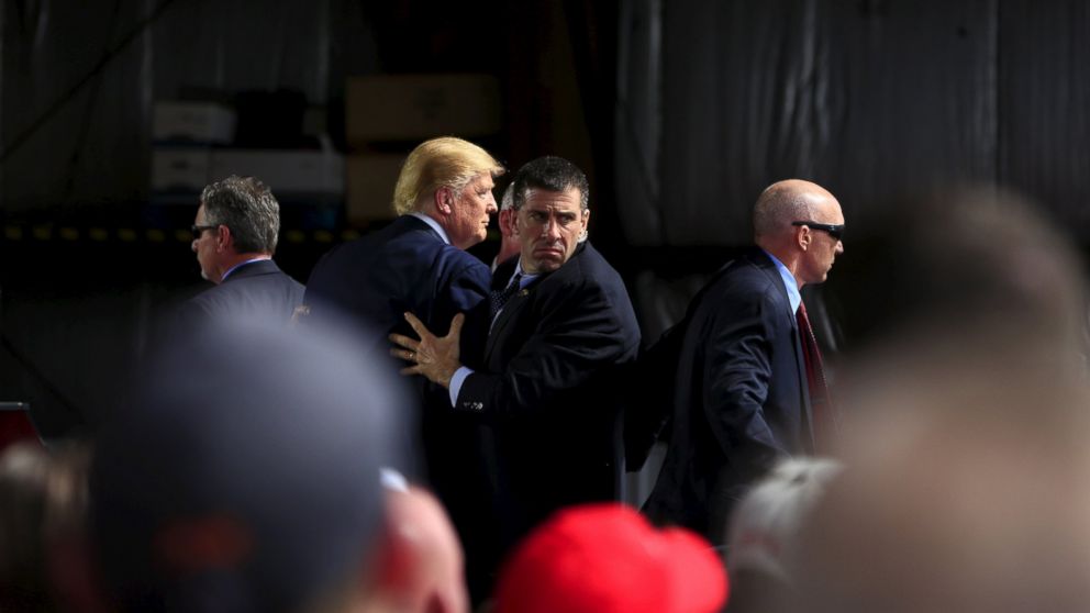 Trump Surrounded by Secret Service as Man Tries Rushing Stage - ABC News